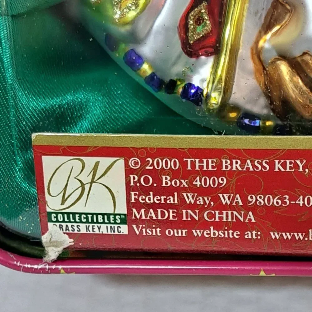 The Brass Key Christmas Treasures Santas Around the World Hand Blown Ornaments